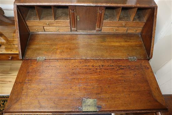 A George III oak bureau W.92cm